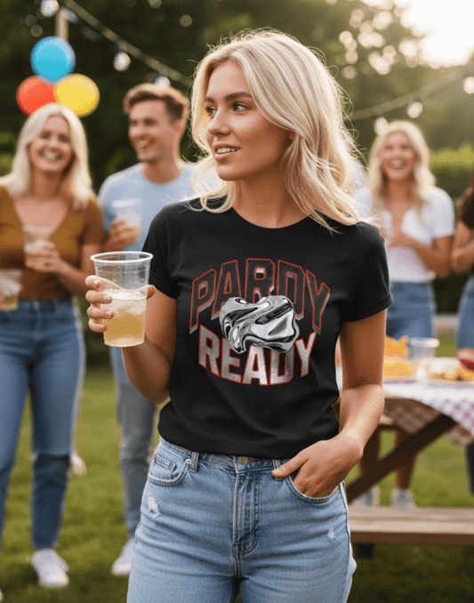 Woman wearing a black carnival t-shirt with 'Pardy Ready' graphic at a party.