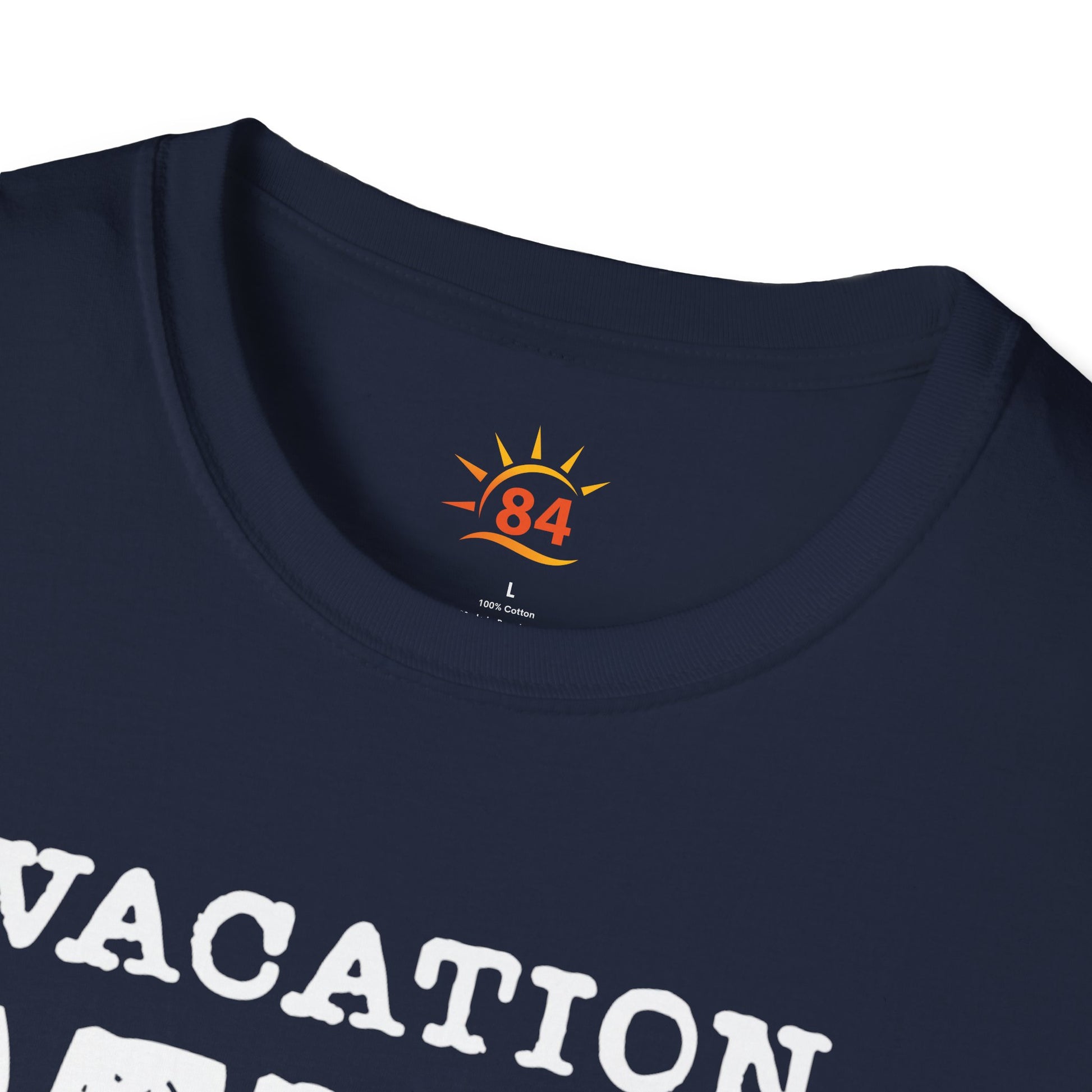 A folded navy blue t-shirt with 'VACATION MUM CHECKLIST' text and bold text and graphics