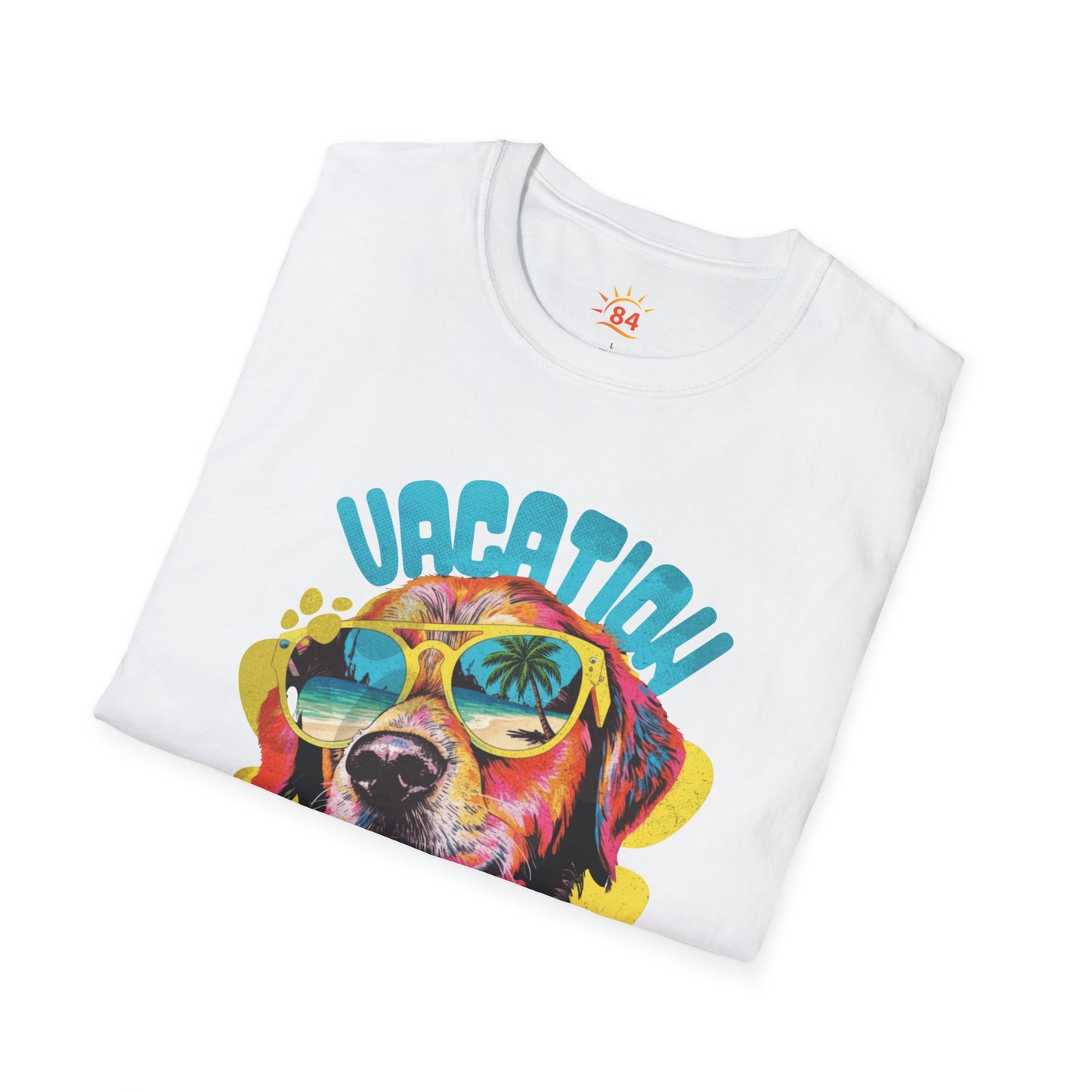 A folded white t-shirt with a dog wearing sunglasses and text that says Vacation Vibes Take a Paws! Time to chill. 