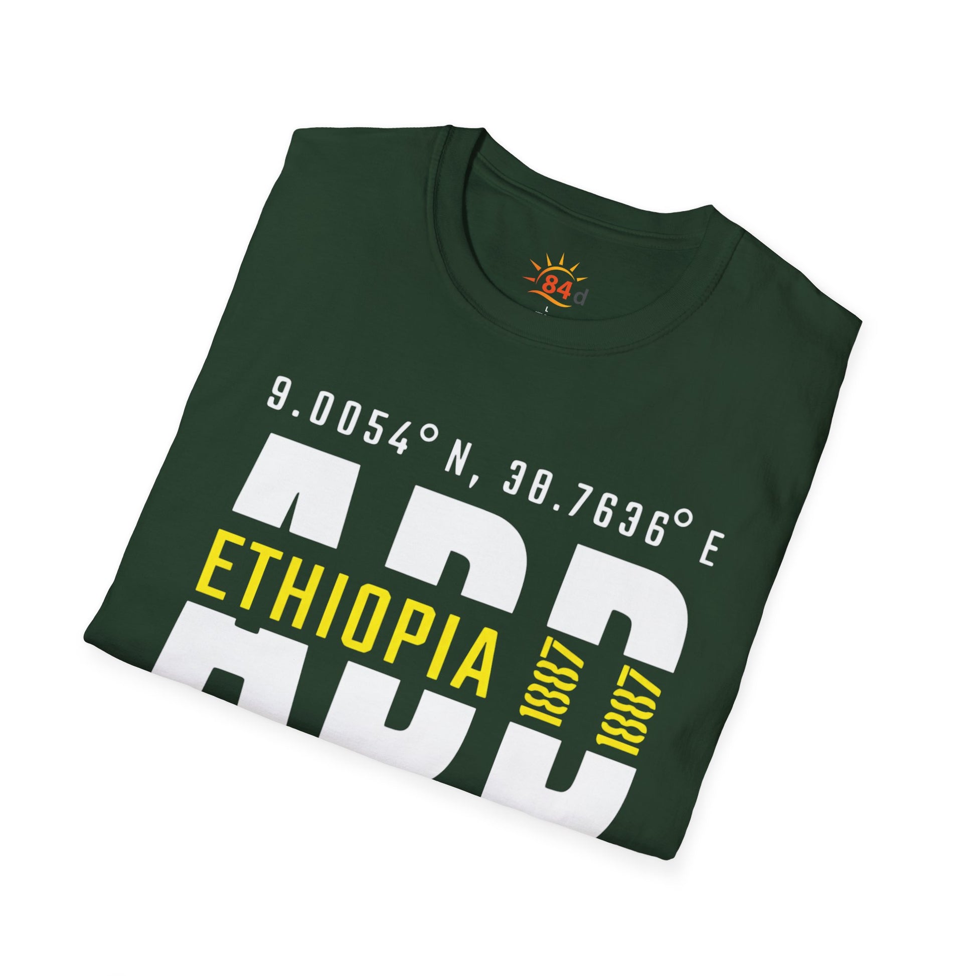A folded green t-shirt with Addis Ababa, Ethiopia, ADD Airport code and coordinates.