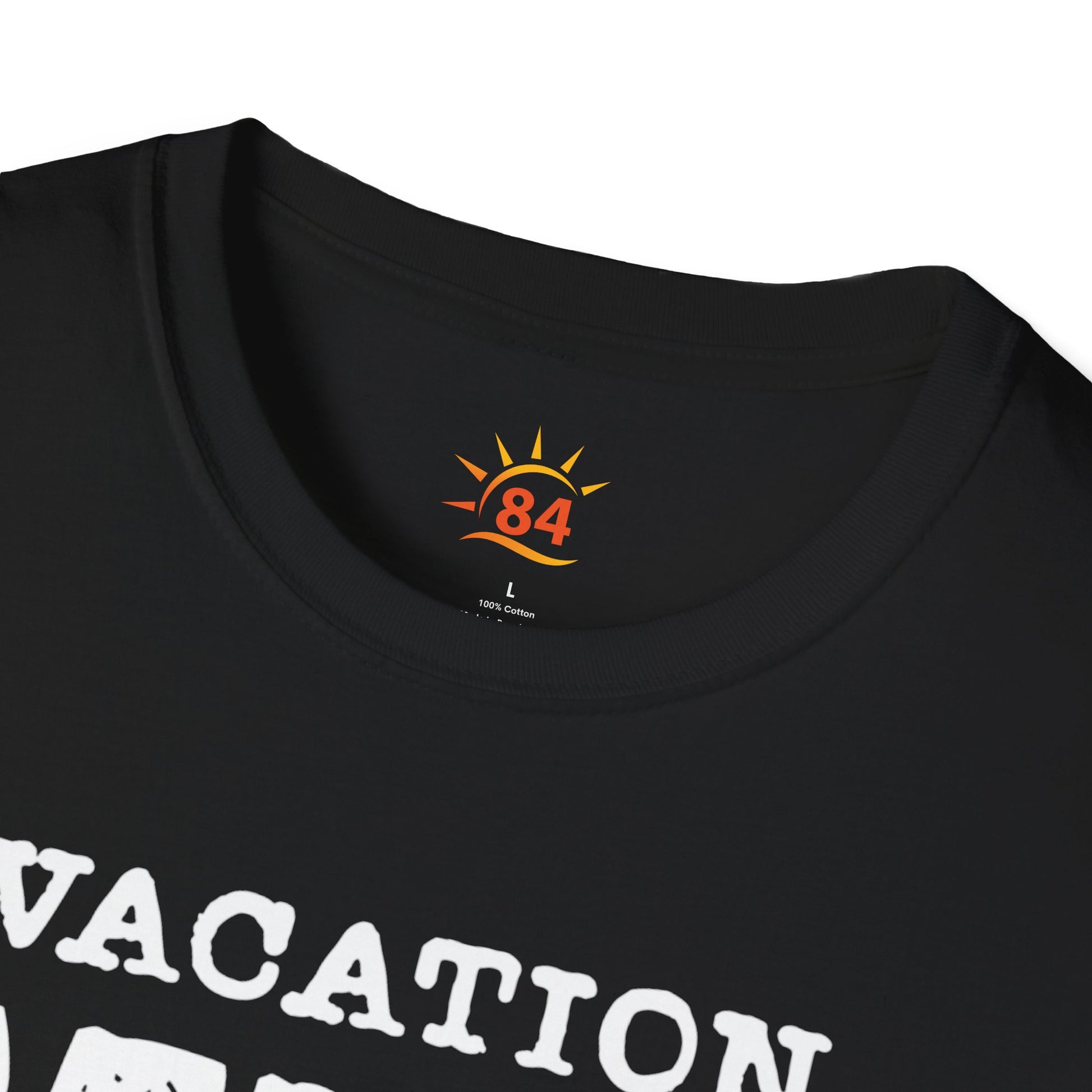 A folded black t-shirt with 'VACATION MUM CHECKLIST' text and bold text and graphics