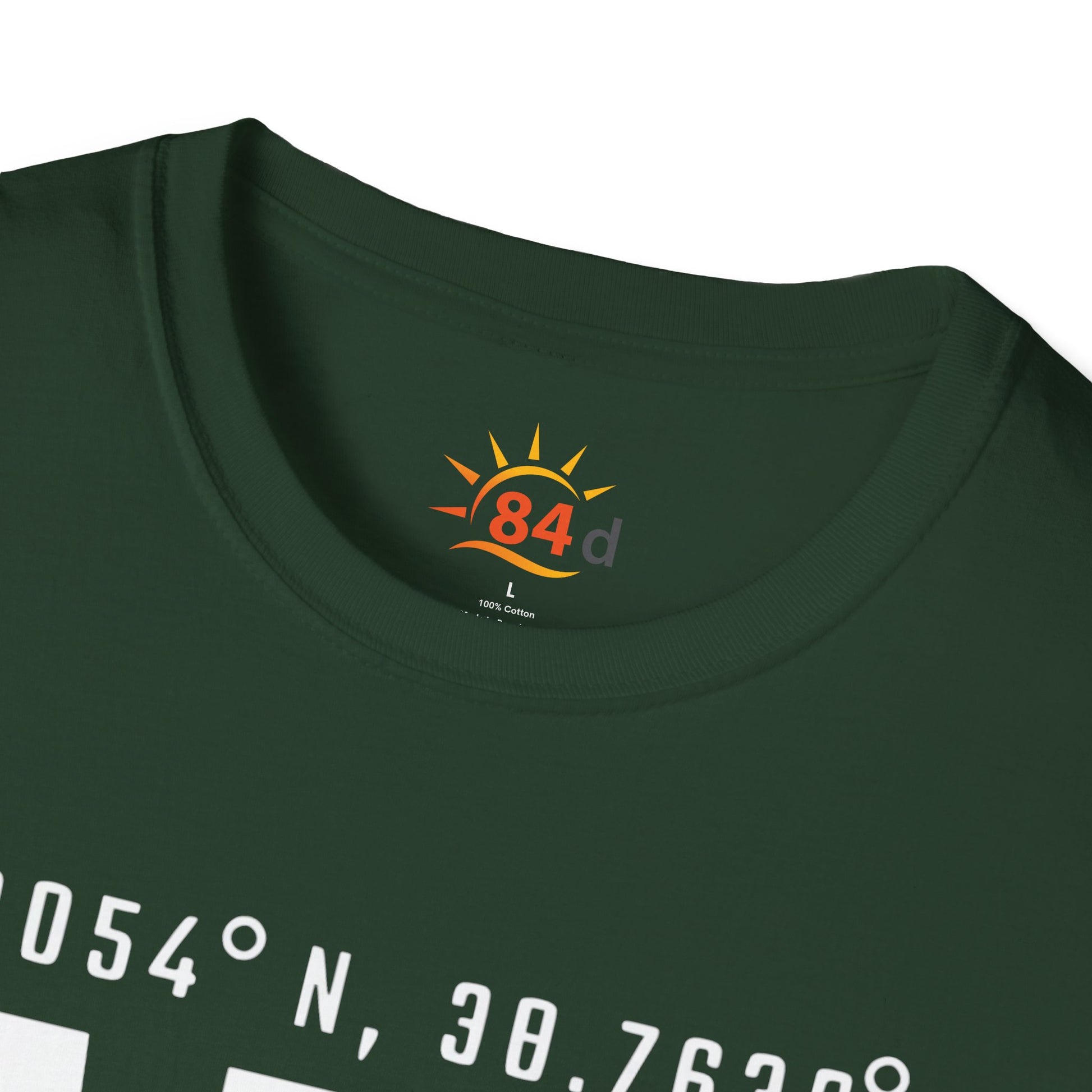 A folded green t-shirt with Addis Ababa, Ethiopia, ADD Airport code and coordinates.