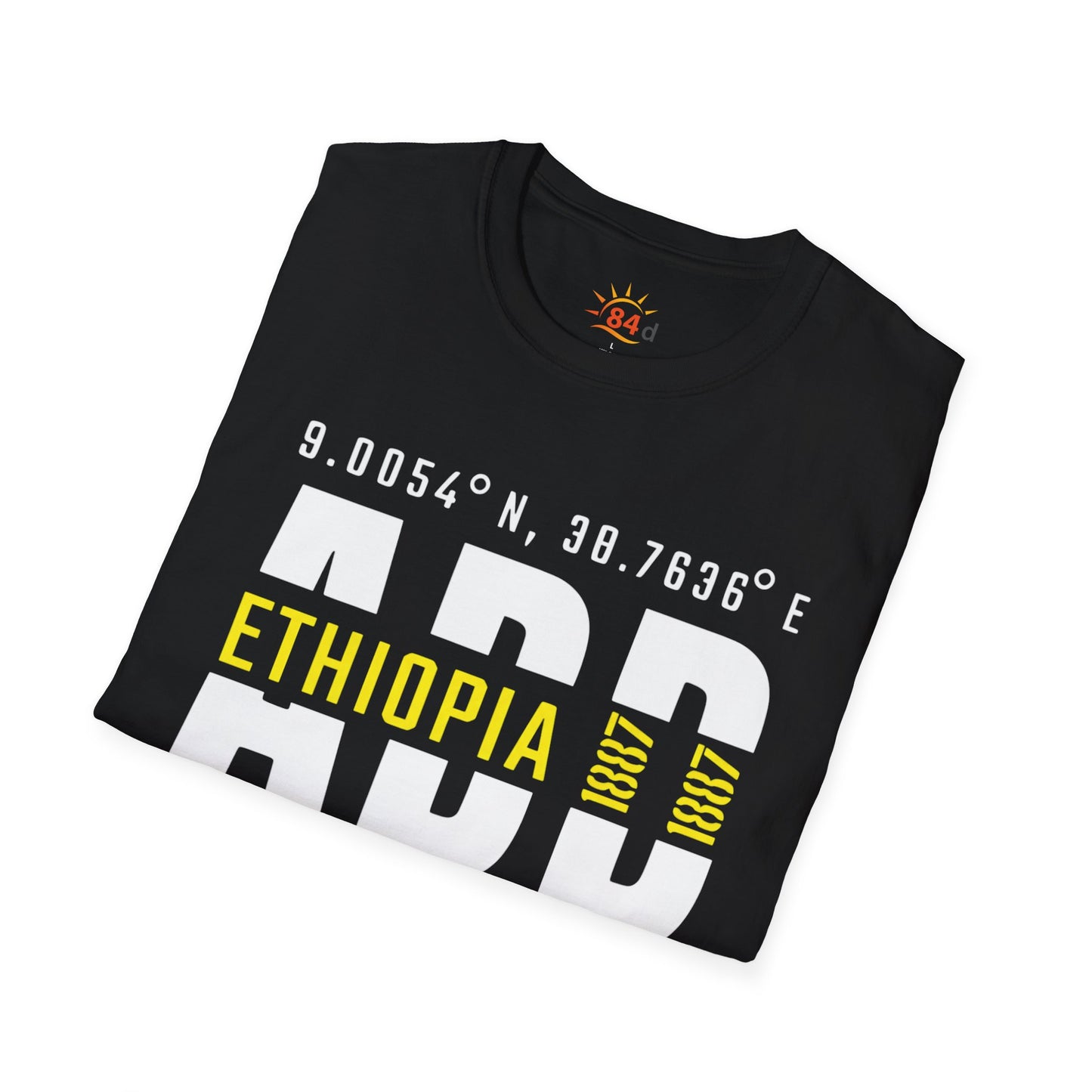 A folded black t-shirt with Addis Ababa, Ethiopia, ADD Airport code and coordinates.