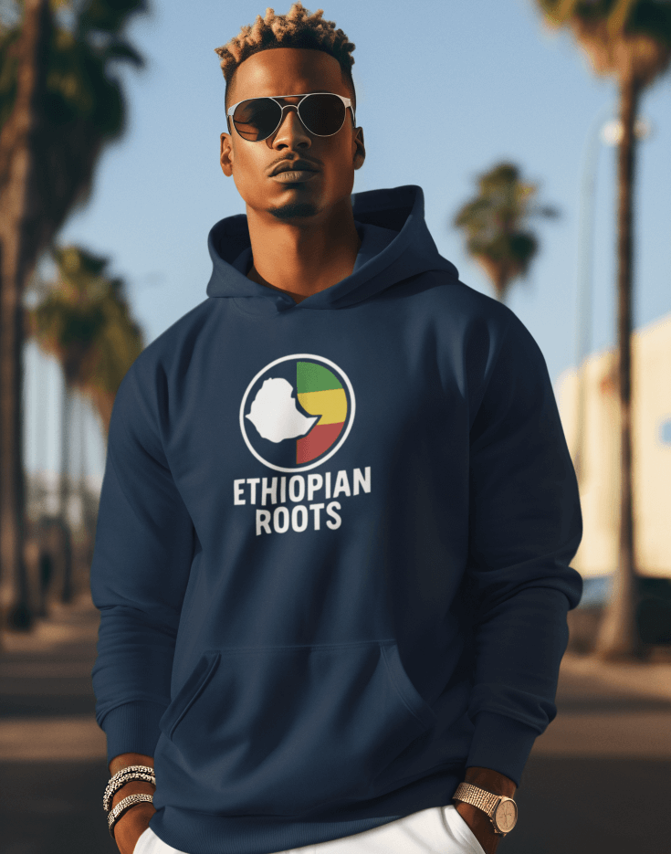Man wearing a navy blue hoodie with 'Ethiopian Roots' flag and map design, outdoors