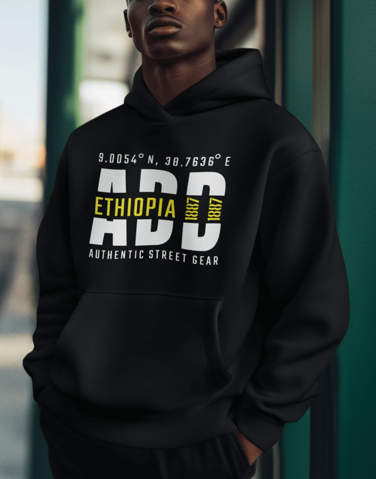 Man wearing a black hoodie with Addis Ababa, Ethiopia, ADD Airport code and coordinates on a blurred background