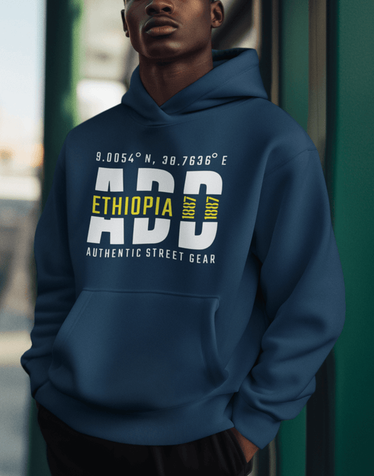 Man wearing a blue hoodie with Addis Ababa, Ethiopia, ADD Airport code and coordinates on a blurred background