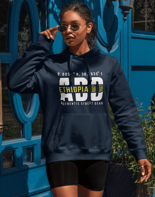 Woman wearing a blue hoodie with Addis Ababa, Ethiopia, ADD Airport code and coordinates on a blurred background