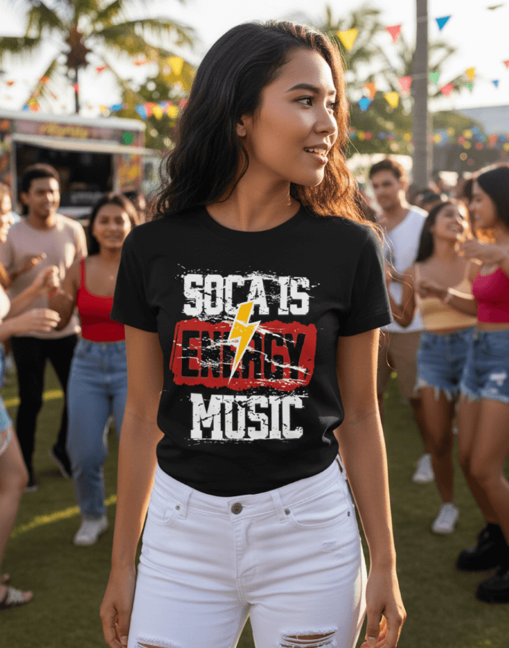 Woman wearing a black 'Soca is Energy Music' t-shirt at a Carnival outdoor event with palm trees.