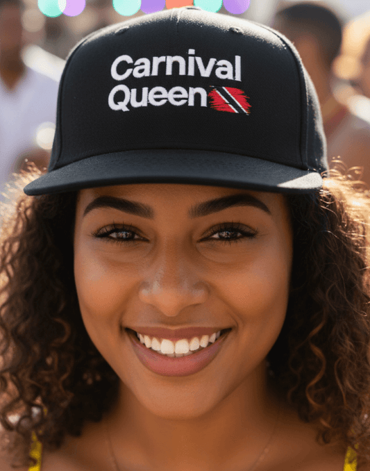 Person wearing a 'Carnival Queen' black snapback cap in a festive setting with colorful costumes in the background