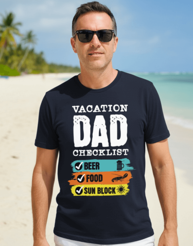 Man wearing a navy blue t-shirt with 'VACATION DAD CHECKLIST' text and bold text and graphics