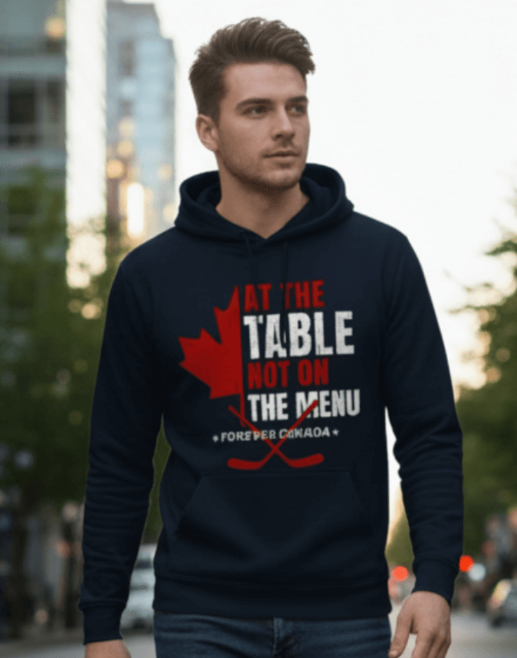 A man outdoors wearing navy blue hoodie with a red and white graphic design. We are at the table not on the menu