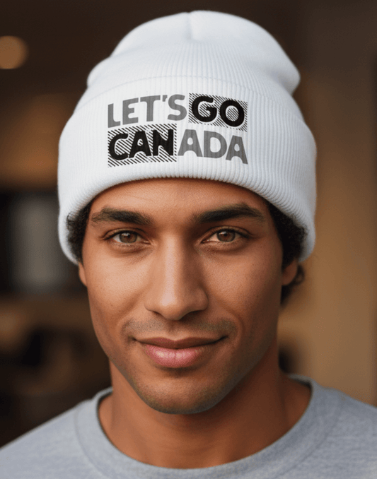 Man wearing a white beanie with 'LET'S GO CANADA' text, blurred background