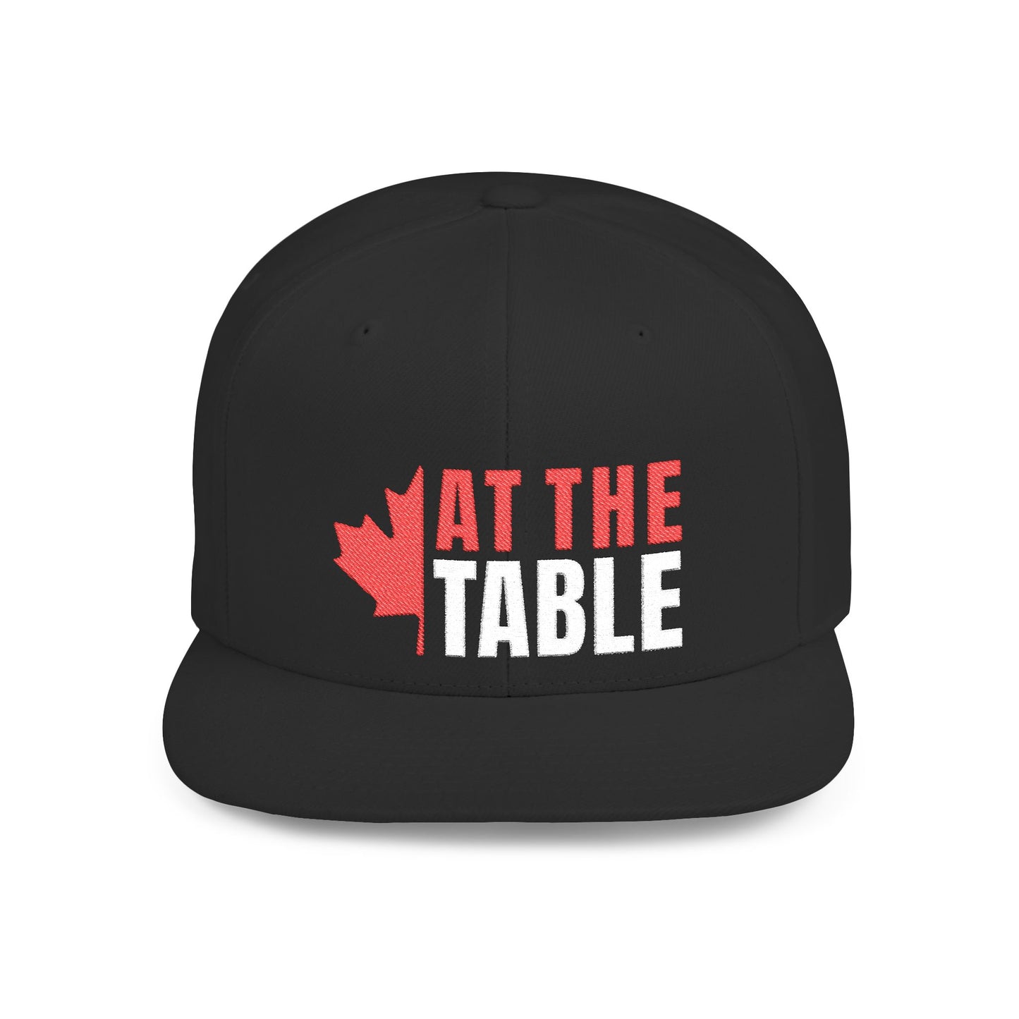A black flat billed snap back cap with 'At the Table' logo