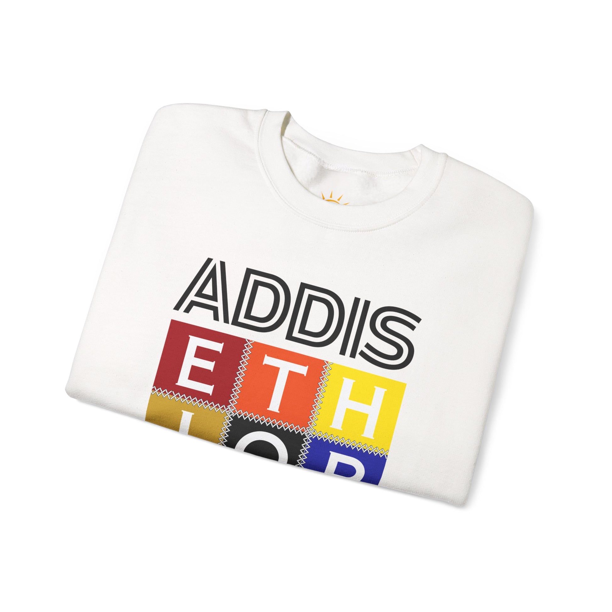 A folded white Addis, Ethiopia, color block,  long-sleeve sweat shirt