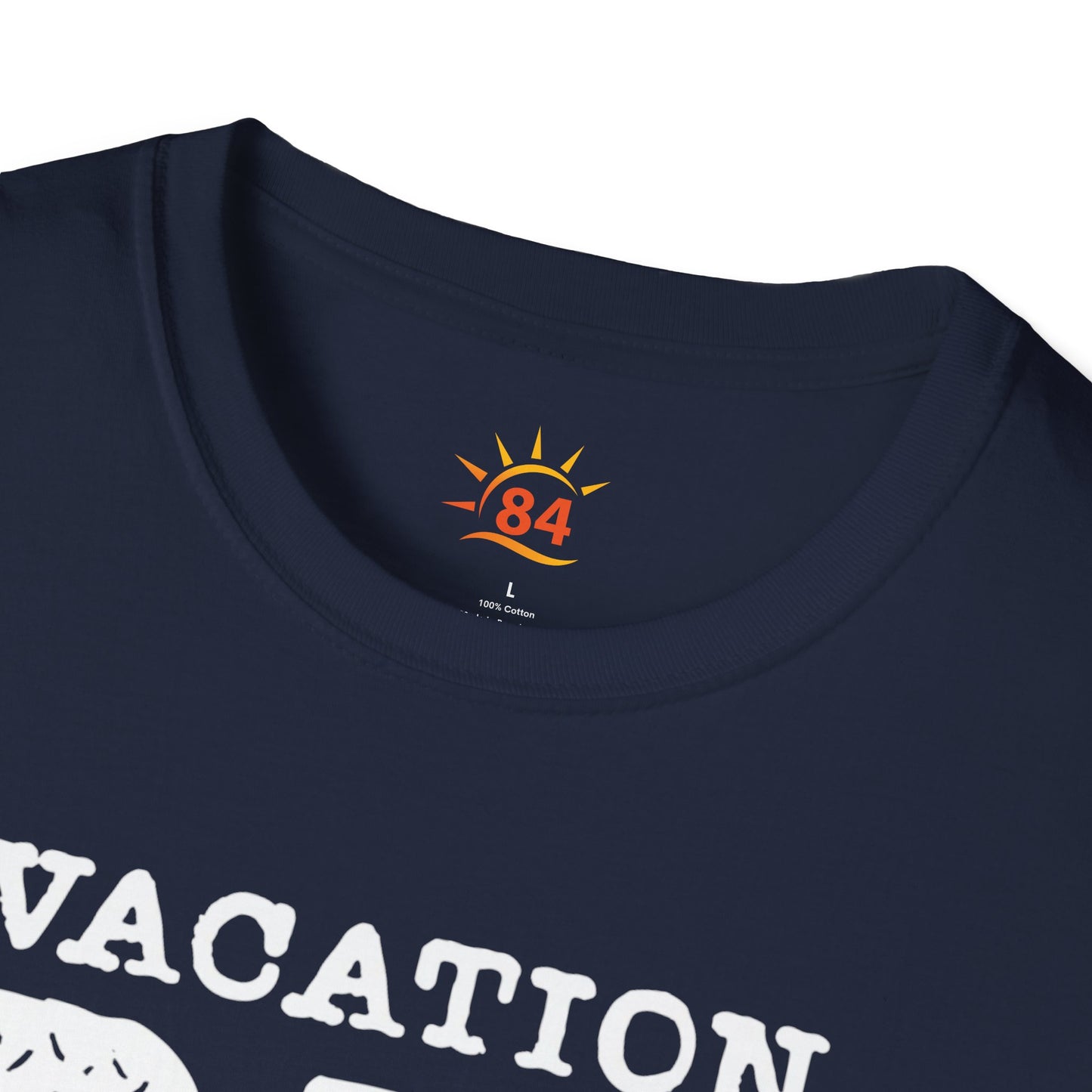 A folded navy blue t-shirt with 'VACATION DAD CHECKLIST' text and bold text and graphics
