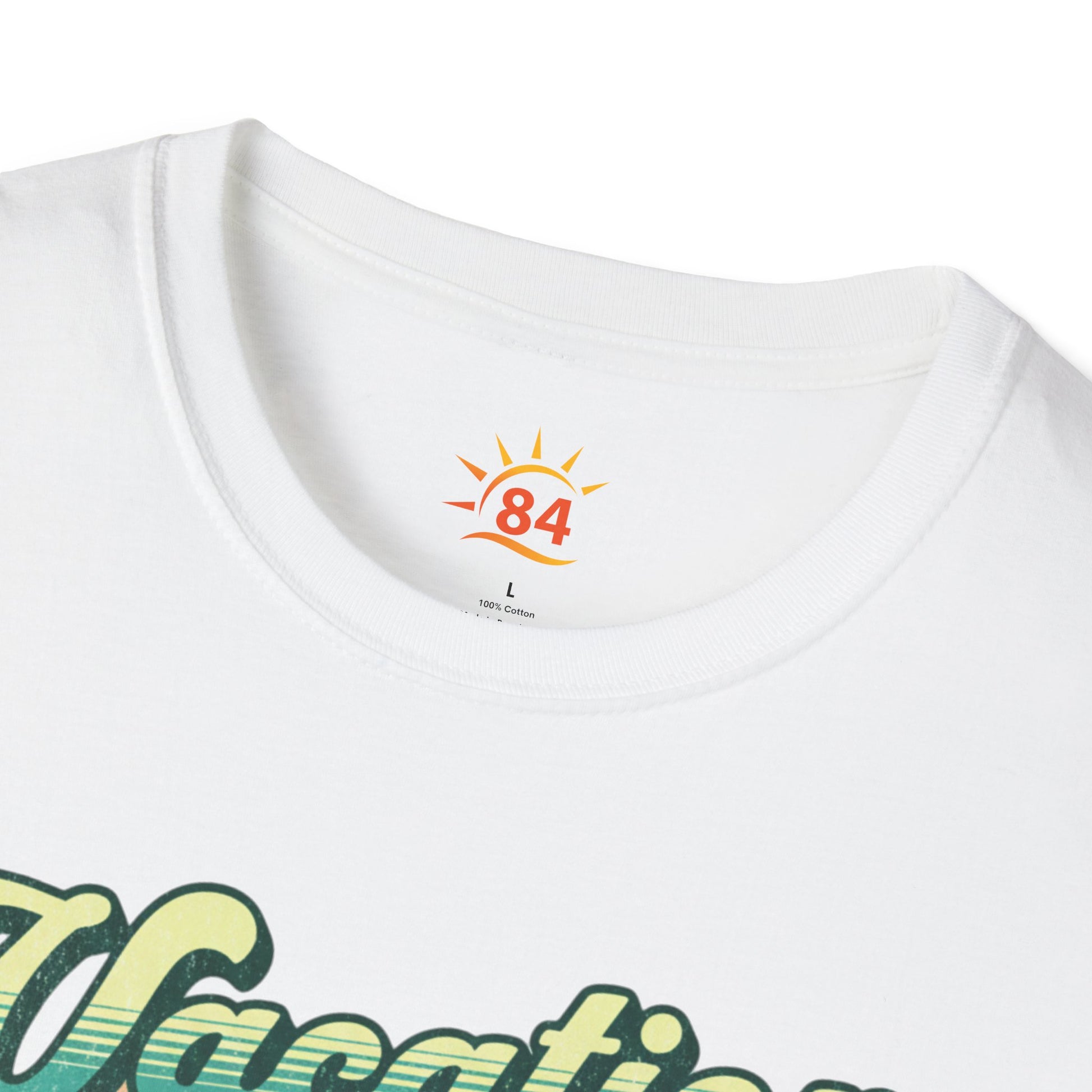 A folded white t-shirt with a graphic print and text that says Vacation - State of Mind - Do not disturb