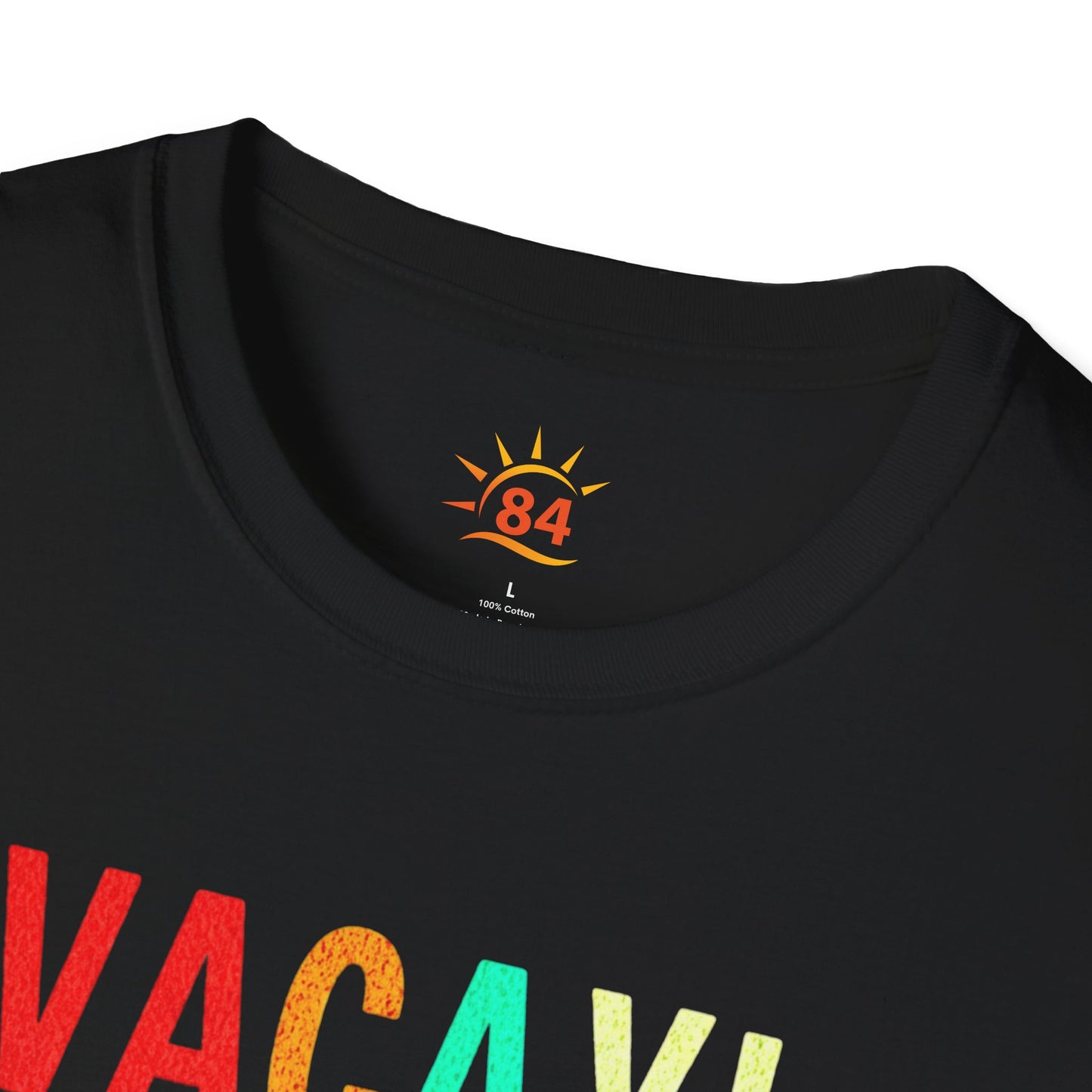 A folded black t-shirt with 'VACAY! TIME TO BEACH' text and palm tree graphics