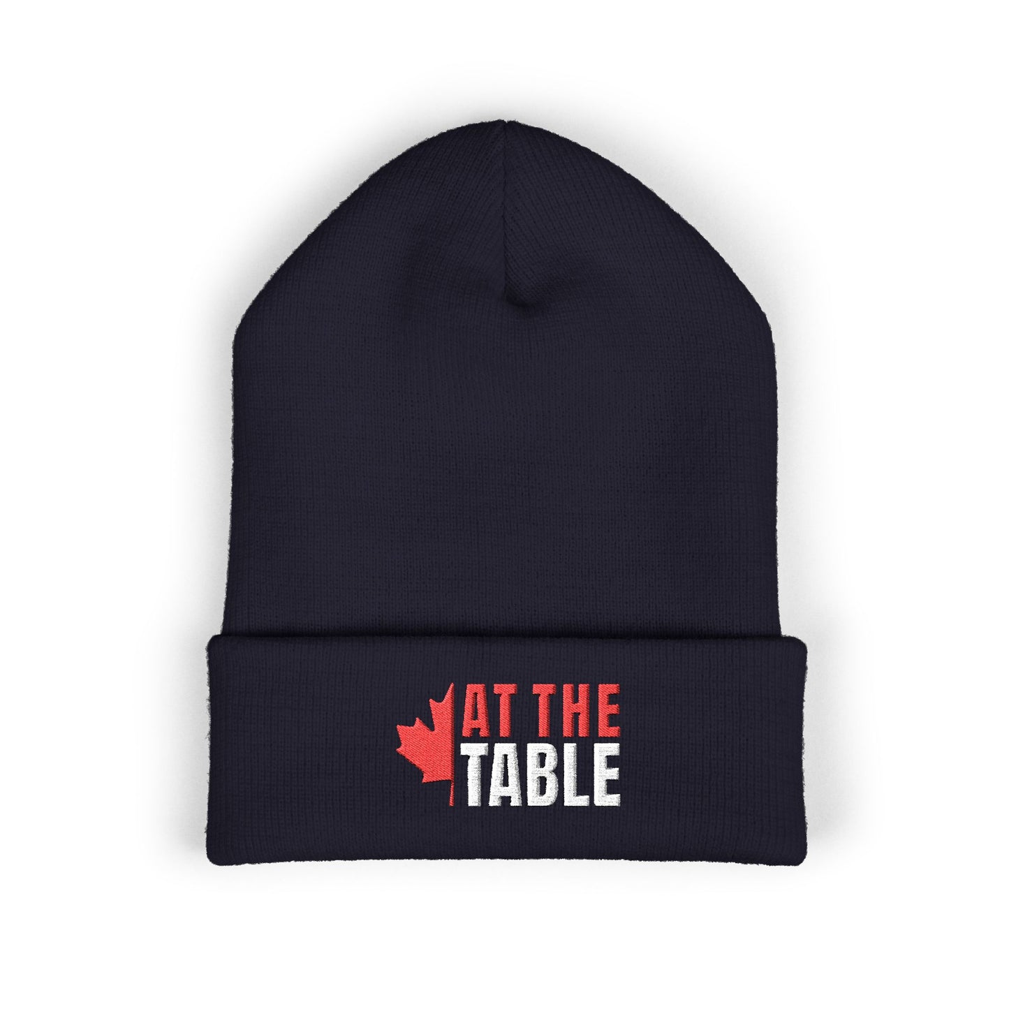 Black beanie with 'At the Table' and a maple leaf design on a white background