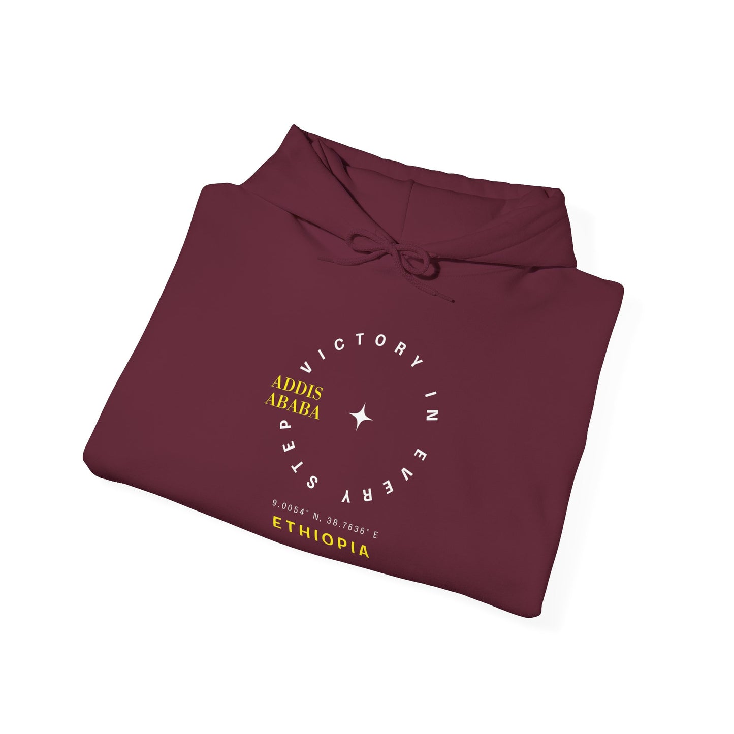 A folded maroon red Ethiopia Addis Ababa hoodie with coordinates text and graphics