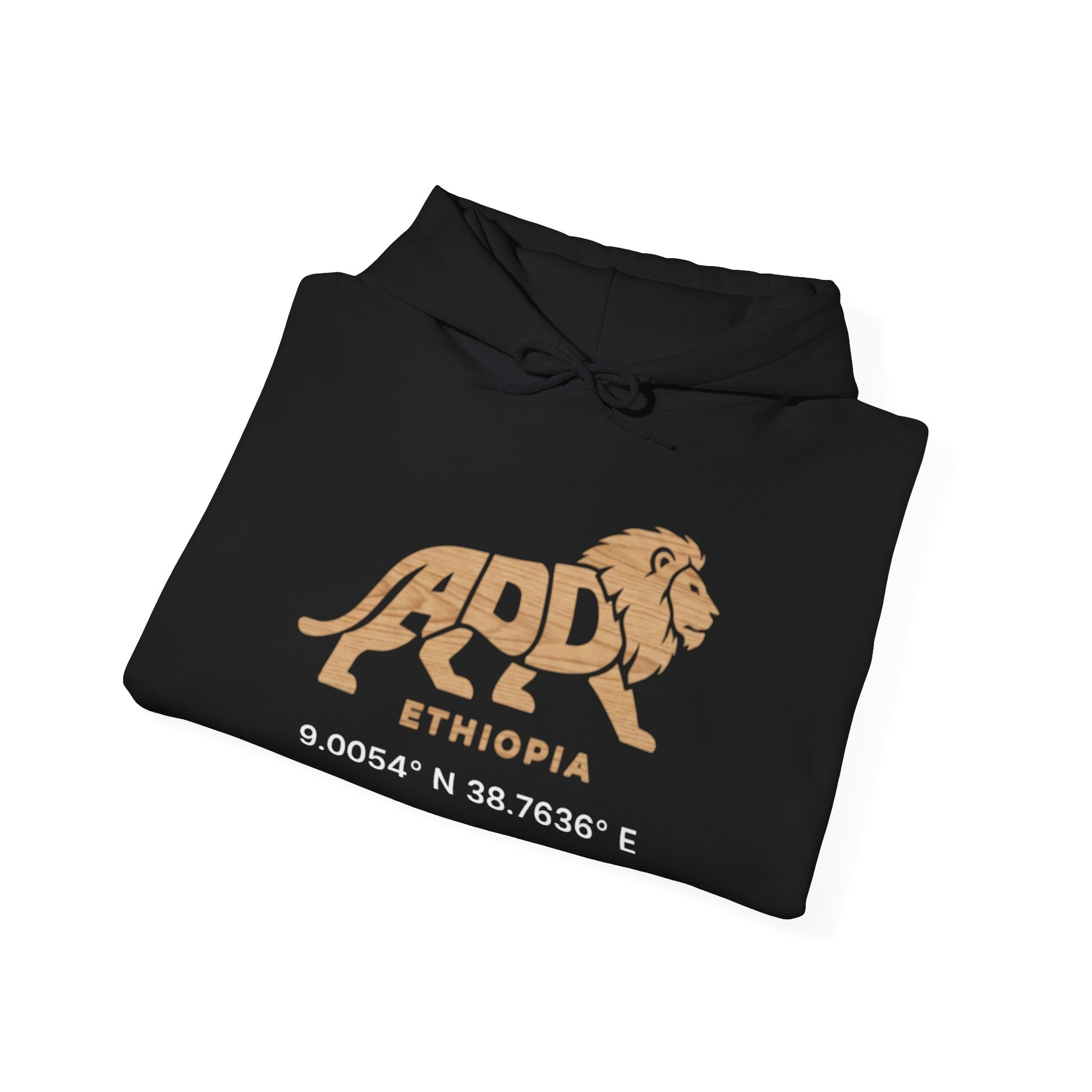 A folded black hoodie with a lion logo and Addis Ababa, Ethiopia coordinates.